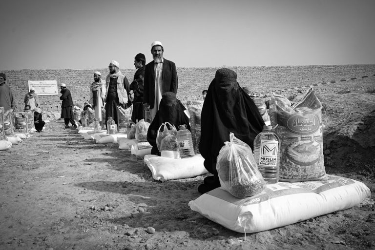 Humanitarian aid setting representing programme and project cycle management